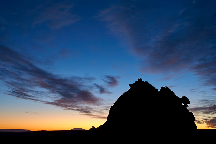 Silhouetted Sandstone Formation At Dawn